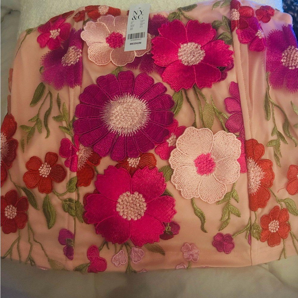 NY&CO Floral stapless top. Size med beautiful top with tag attached.NWT